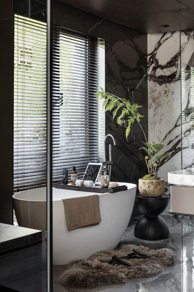 Floor-to-ceiling shower curtain creating the illusion of higher ceilings in a small bathroom.