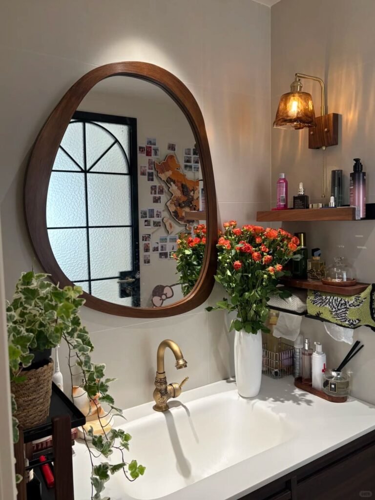 Small bathroom featuring unlacquered brass fixtures with a timeless vintage-inspired finish.