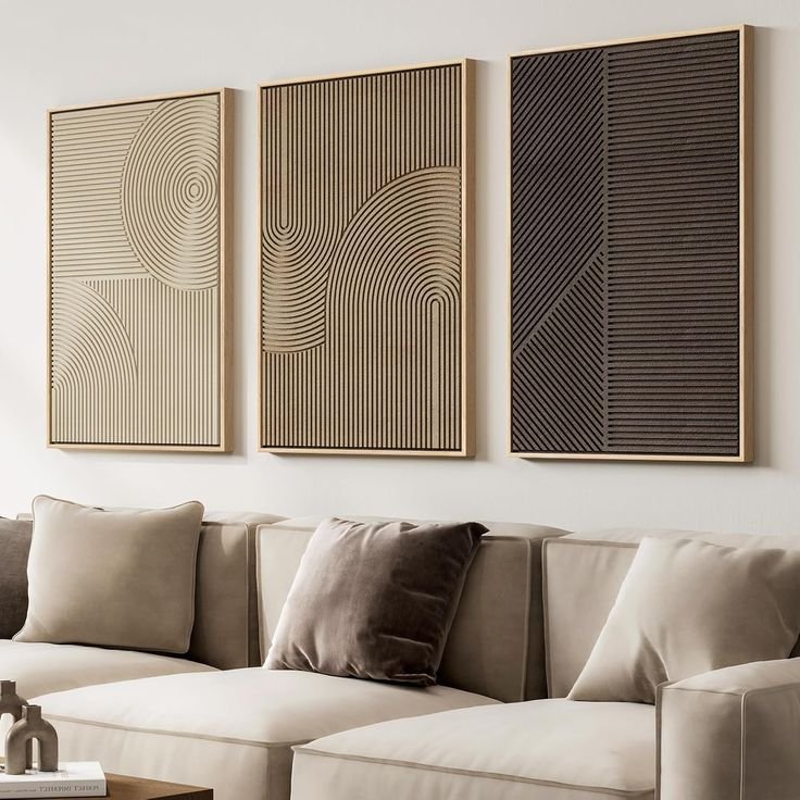 Three-piece creamy, black, beige minimalist line art gallery set on a neutral bedroom wall.