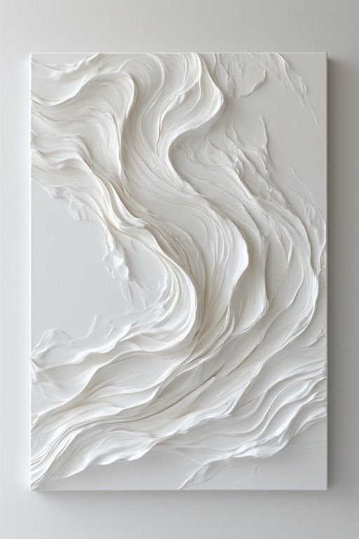 Large scale white textured plaster wall art hanging above a cloud bed cover.