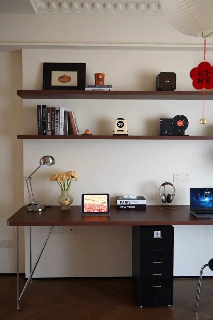 Large decorative analog wall clock serving as a statement piece in a modern home office.