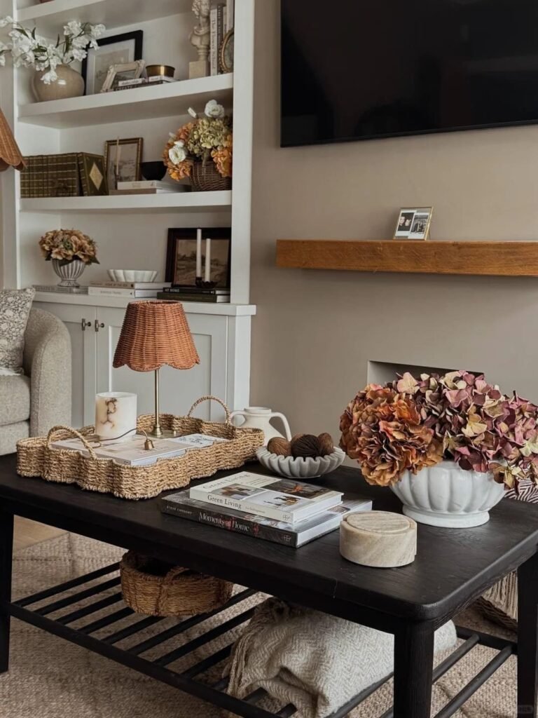 Seasonal decor including pinecones, branches, and natural elements.